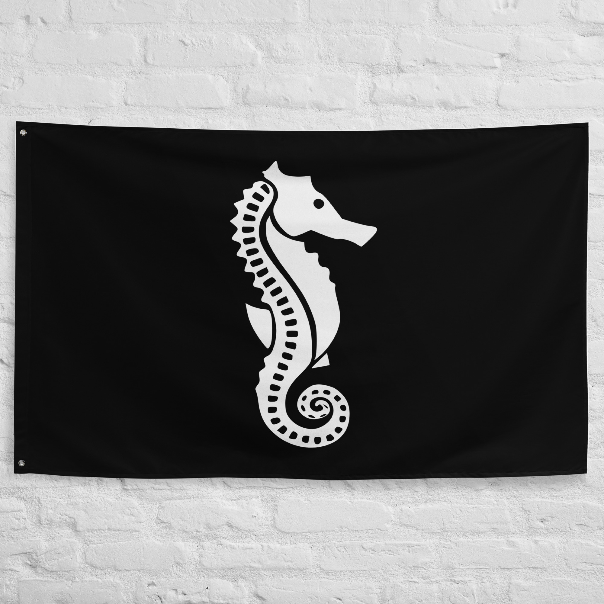 a-newman-pirate-flag.jpg A. Newman Pirate Flag featuring a white seahorse emblem on a black field, historic Jolly Roger banner associated with pirate and maritime traditions.