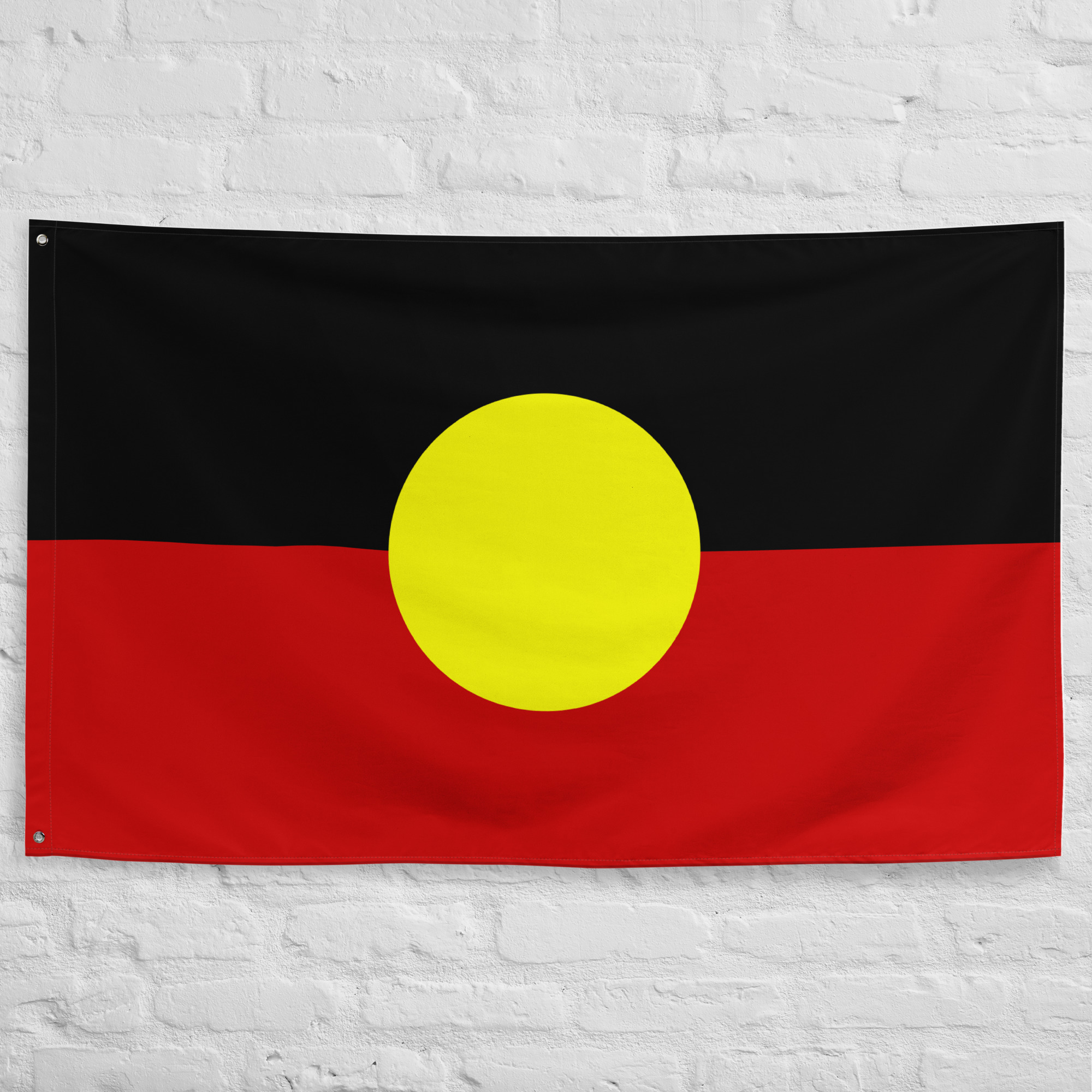 australian-aboriginal-flag-indigenous-heritage-banner Australian Aboriginal Flag featuring a yellow sun on black and red fields representing Indigenous Australian heritage, culture, and identity.