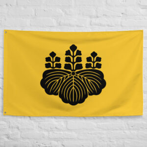 Toyotomi Clan Crest Flag featuring the historic black paulownia Toyotomi family mon on a yellow background representing the clan of Toyotomi Hideyoshi.